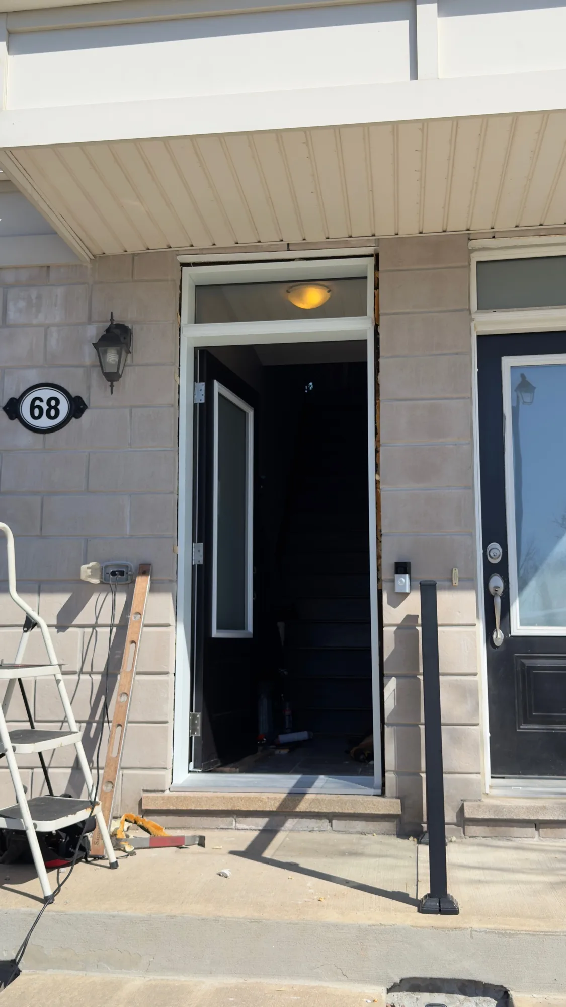 Completed door installation with sidelight at residential entry — D&D Exterior Finishing Kitchener-Waterloo