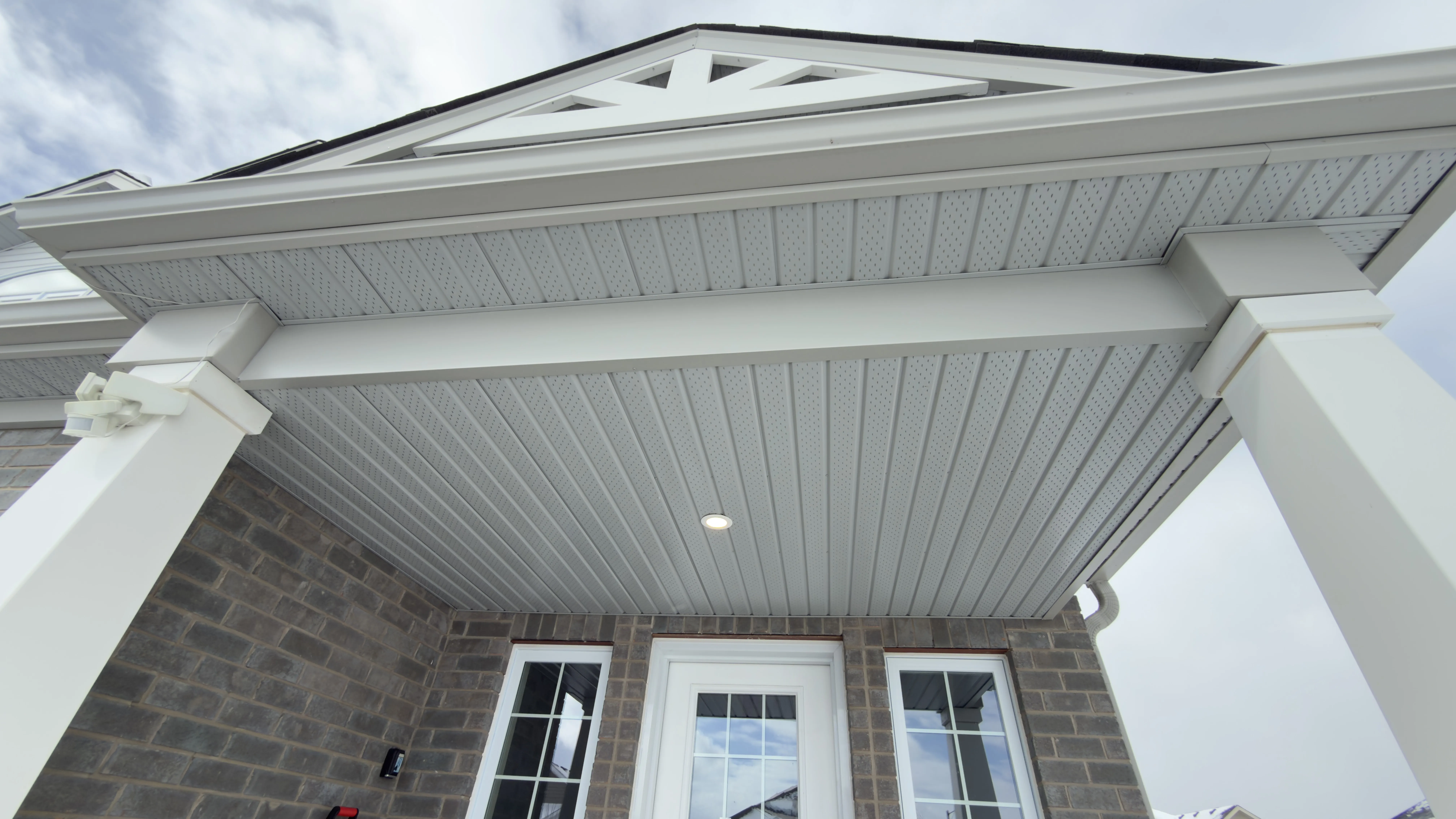 Vented soffit and fascia detail on Ontario covered porch — D&D Exterior Finishing